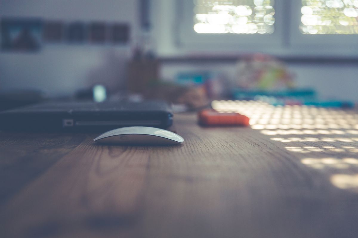 Creative designer's desk with tools and sketches