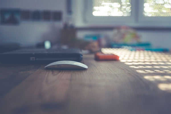 Creative designer's desk with tools and sketches