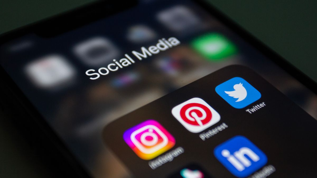 Smartphone screen showing a folder of social media apps