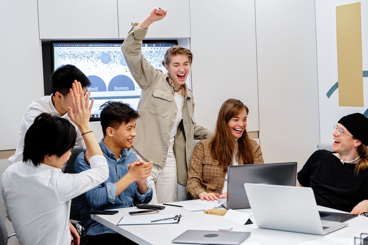 Marketing team collaborating on a campaign in the office
